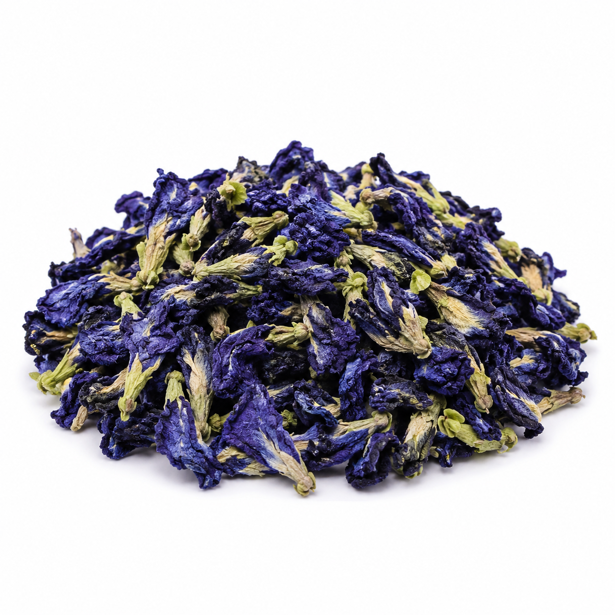 Pile of dried blue butterfly pea flowers on a white background